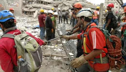Scouts clearing the rubble in Mexico